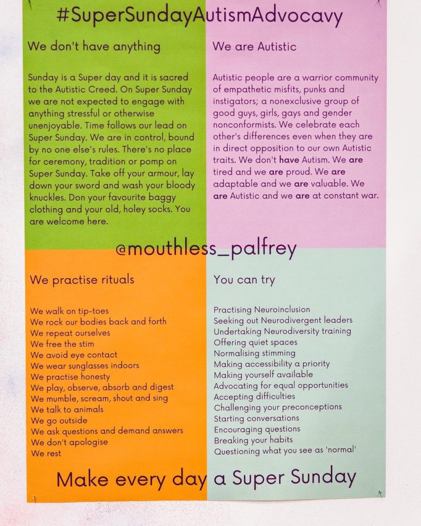 A bright poster of green, pink, orange and blue displayed on a white wall.